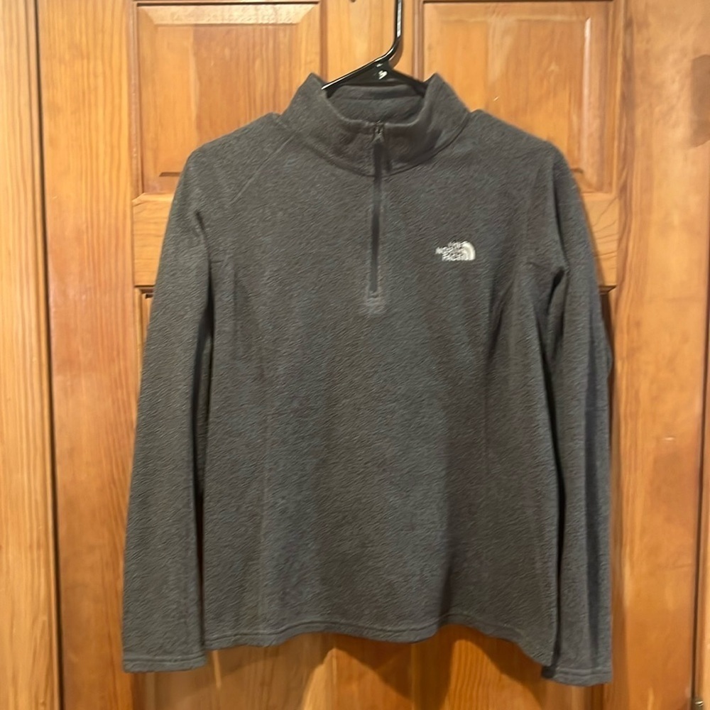 The North Face women’s gray fleece 1/4 zip up pull over size medium.
